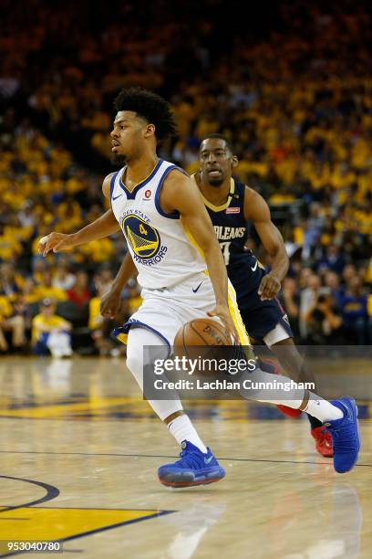 Quinn Cook of the Golden State Warriors dribbles the ball during Game One of the Western Conference Semifinals at ORACLE Arena on April 28, 2018 in...