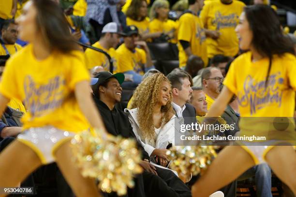 Recording artists Jay-Z ad Beyonce look on during Game One of the Western Conference Semifinals between the New Orleans Pelicans and the Golden State...