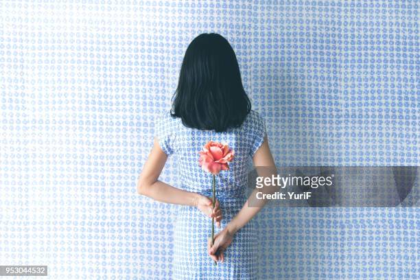 woman in blue - shy stock pictures, royalty-free photos & images