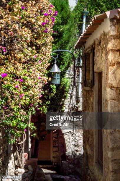 streets of the medieval village of eze, eze, french riviera, france - eze village fotografías e imágenes de stock