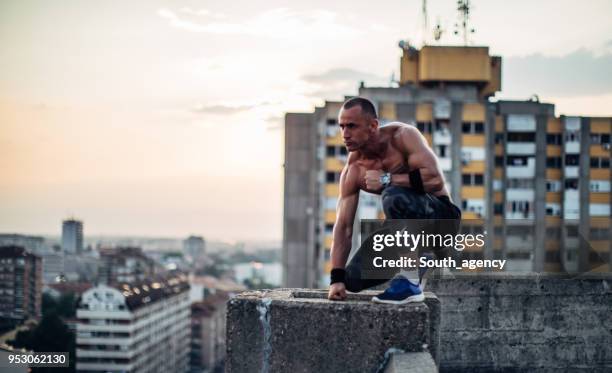 Fearless Men Kneeling Figures Photos and Premium High Res Pictures - Getty Images