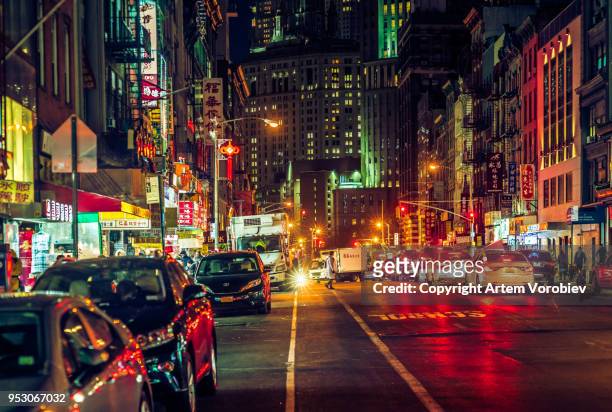 manhattan chinatown at night - chinatown stock pictures, royalty-free photos & images