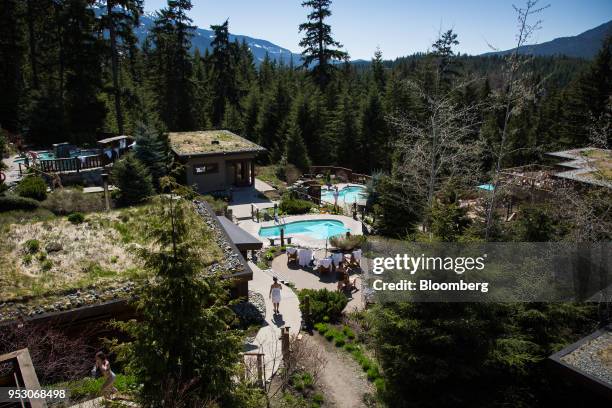 Customers walk through the Scandinave Spa in Whistler, British Columbia, Canada, on Friday, April 27, 2018. The cost of a typical home in Whistler...