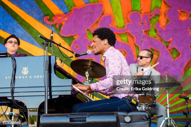 Jon Batiste performs during the New Orleans Jazz & Heritage Festival at Fair Grounds Race Course on April 29, 2018 in New Orleans, Louisiana.