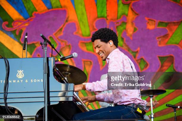 Jon Batiste performs during the New Orleans Jazz & Heritage Festival at Fair Grounds Race Course on April 29, 2018 in New Orleans, Louisiana.