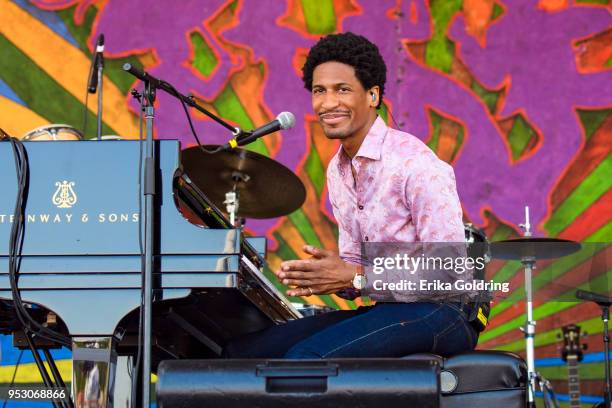 Jon Batiste performs during the New Orleans Jazz & Heritage Festival at Fair Grounds Race Course on April 29, 2018 in New Orleans, Louisiana.