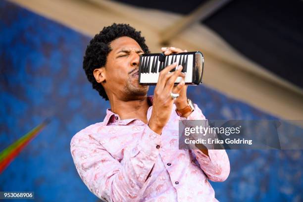 Jon Batiste performs during the New Orleans Jazz & Heritage Festival at Fair Grounds Race Course on April 29, 2018 in New Orleans, Louisiana.