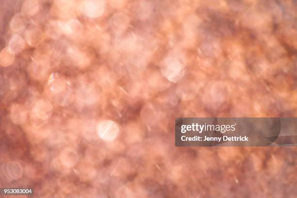 rose gold glitter background - red gold party stock pictures, royalty-free photos & images