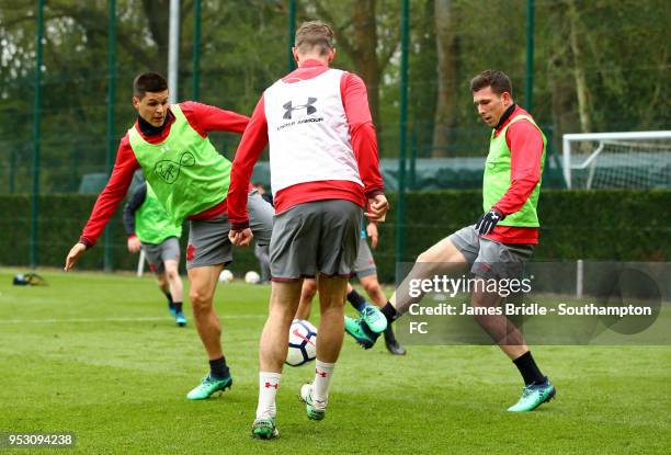 LtoR Guido Carrillo, Jack Stephens and Pierre-Emile Hojbjerg during a Southampton FC Training session at Staplewood Complex on April 30, 2018 in...