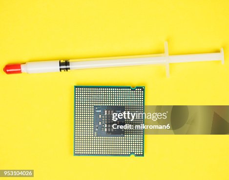 Computer Processor Chip CPU and Thermal Grease Paste Computer Processor Chip CPU and Thermal Grease Paste