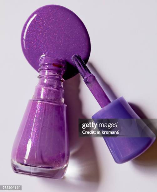 purple nail varnish, nail polish - purple nail polish stock pictures, royalty-free photos & images