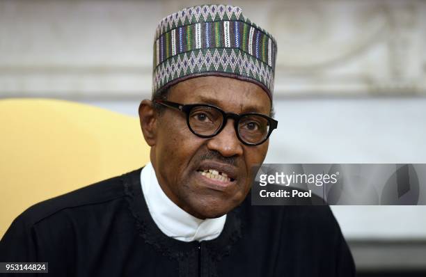 Nigerian President Muhammadu Buhari speaks during a meeting with US President Donald Trump in the Oval Office of the White House on April 30, 2018 in...