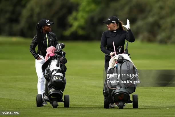 Nicola Bennett and Beth Scott of Woburn GC chat during the WPGA One Day Series at Little Aston Golf Club on April 30, 2018 in Sutton Coldfield,...