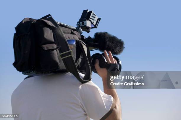 cameraman at work outdoors - cameraman stockfoto's en -beelden