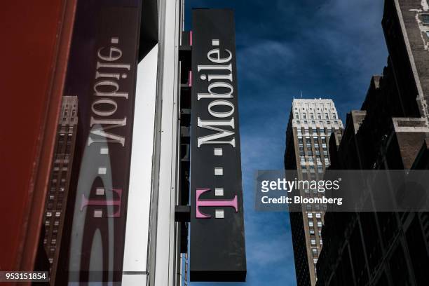 Mobile US Inc. Sigange is displayed outside a store location in New York, U.S., on Monday, April 30, 2018. Sprint Corp. Suffered its worst stock...