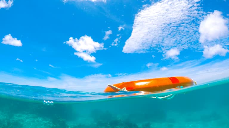 https://media.gettyimages.com/id/953153114/video/life-saving-buoy-in-the-water.jpg?b=1&s=640x640&k=20&c=d45XgELBpT2JDQaBmobsutlxDpy78cArq79HGkfrA14=