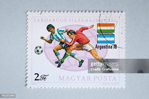 stockillustraties, clipart, cartoons en iconen met close up of hungarian post stamp showing soccer players - 1978