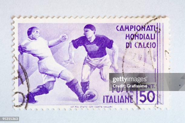 nahaufnahme der italienischen post-stempel mit soccer player - 1956 stock-grafiken, -clipart, -cartoons und -symbole