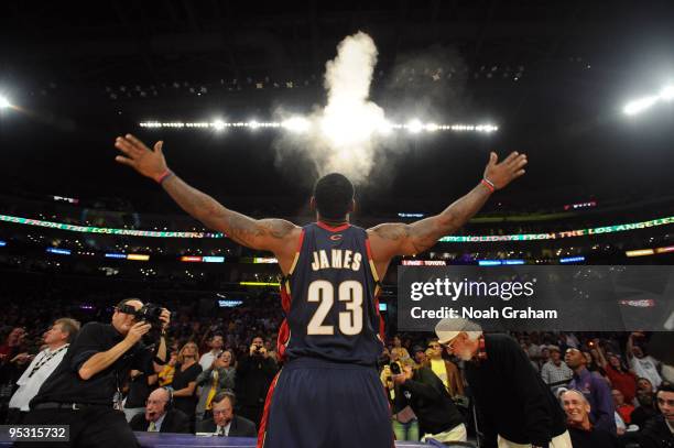 LeBron James of the Cleveland Cavaliers throws powder into the air before a game against the Los Angeles Lakers at Staples Center on December 25,...