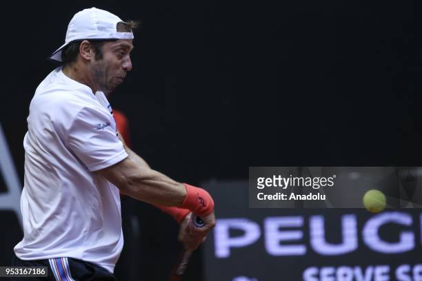 Paolo Lorenzi of Italy in action against Cem Ilkel of Turkey during the TEB BNP Paribas Istanbul Cup men's singles tennis match at the Garanti Koza...