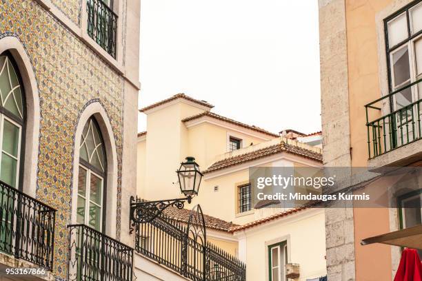 Old Lisbon Portugal steet. Arch and stair. Buildings facade