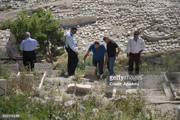 Palestinians gather to protest Israeli attacks on Babu'r Rahme Cemetery near the Masjid al-Aqsa in Jerusalem on April 20, 2018. Israeli officials had...