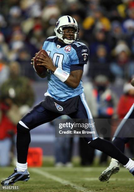 Vince Young of the Tennessee Titans drops back to pass against the San Diego Chargers on December 25, 2009 at LP Field in Nashville, Tennessee.