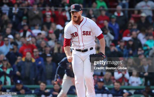 Boston Red Sox pitcher Craig Kimbrel reacts after striking out Tampa Bay Rays' Carlos Gomez for the final out of the game and a 4-3 Boston victory....