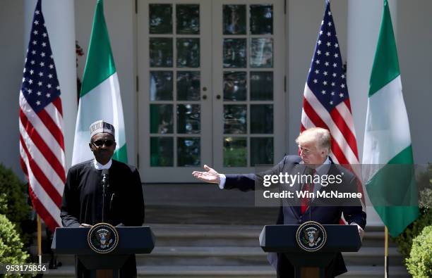 President Donald Trump and Nigerian President Muhammadu Buhari answer questions during a joint press conference in the Rose Garden of the White House...