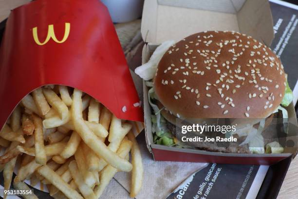 In this photo illustration, a McDonald's Big Mac and french fries are seen on a tray on April 30, 2018 in Miami, Florida. The fast-food restaurant...