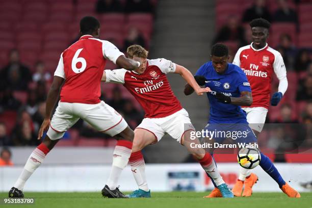 Danny Ballard of Arsenal and Daishawn Redan of Chelsea battle for possession during the FA Youth Cup Final second leg between Chelsea and Arsenal at...