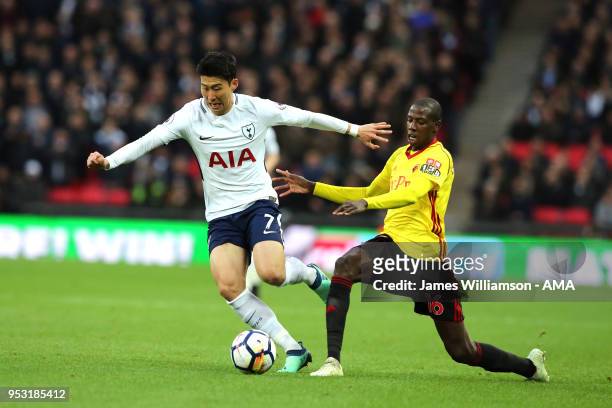 Son Heung-min of Tottenham and Jerome Sinclair of Watford during the Premier League match between Tottenham Hotspur and Watford at Wembley Stadium on...