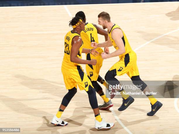 Myles Turner and Domantas Sabonis of the Indiana Pacers react to a play against the Cleveland Cavaliers in Game Six of Round One of the 2018 NBA...
