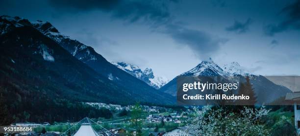 mountains surrounding the village of fulpmes, tyrol, austria - neustift im stubaital stock pictures, royalty-free photos & images