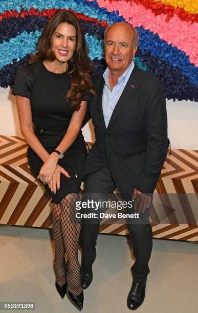 Christina Estrada and Enrico Giacometti attend a private view of "On Top Of The World", an exhibition hosted by David Linley created with...