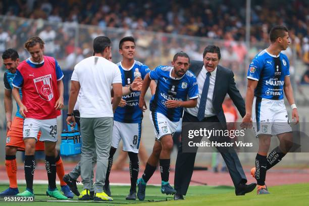 Erbin Trejo of Queretaro celebrates after scoring the first goal of his team during the 17th round match between Pumas UNAM and Queretaro as part of...