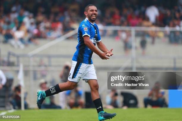 Erbin Trejo of Queretaro celebrates after scoring the first goal of his team during the 17th round match between Pumas UNAM and Queretaro as part of...