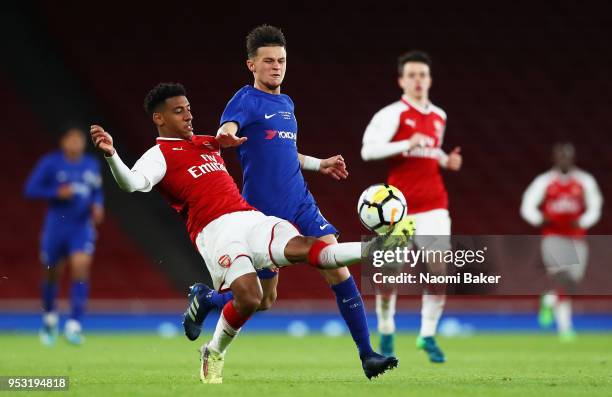 Dominic Thompson of Arsenal FC battles for posession with George Mceachran of Chelsea FC during the FA Youth Cup Final, second leg match between...