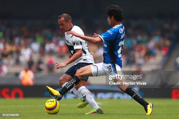 Marcelo Diaz of Pumas struggles for the ball with Jaime Gomez of Queretaro during the 17th round match between Pumas UNAM and Queretaro as part of...