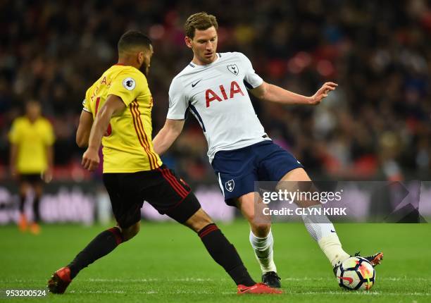 Tottenham Hotspur's Belgian defender Jan Vertonghen vies with Watford's English-born Jamaican defender Adrian Mariappa during the English Premier...