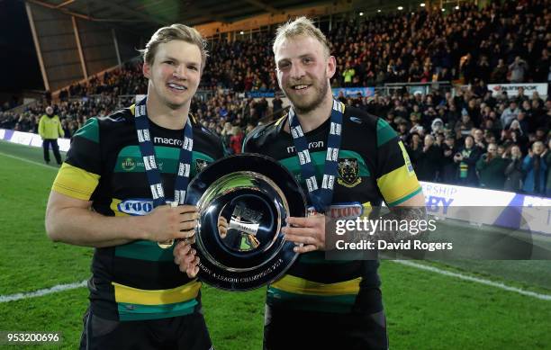 Tom Stephenson and Ben Nutley the Northampton Wanderers co captains celebrate their victory during the Aviva A League Final between Northampton...