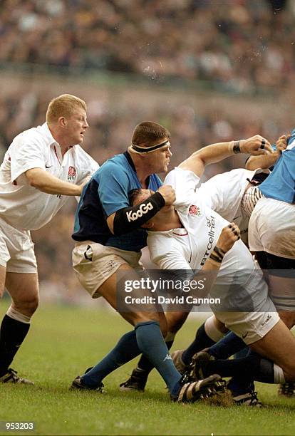 Andrea Lo Cicero of Italy takes out Martin Johnson of England during the Lloyds TSB Six Nations Championship 2001 match played at Twickenham, in...