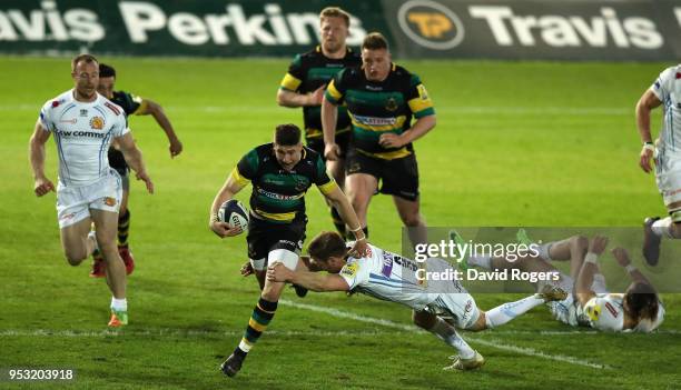 James Grayson of Northampton breaks away from Will Chudley during the Aviva A League Final between Northampton Wanderers and Exeter Braves at...