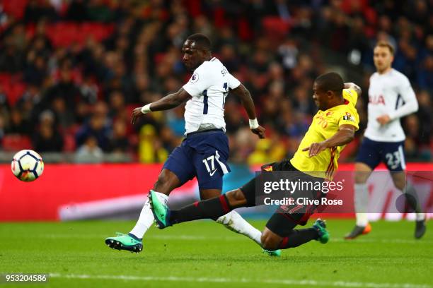 Moussa Sissoko of Tottenham Hotspur shoots and misses past Christian Kabasele of Watford during the Premier League match between Tottenham Hotspur...