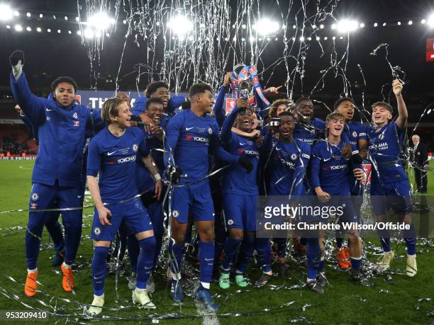 Chelsea celebrate winning the Youth Cup with the trophy during The Youth Cup Final, Second Leg between Arsenal and Chelsea at Emirates Stadium on...