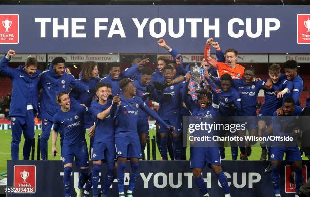 Chelsea celebrate winning the Youth Cup with the trophy during The Youth Cup Final, Second Leg between Arsenal and Chelsea at Emirates Stadium on...