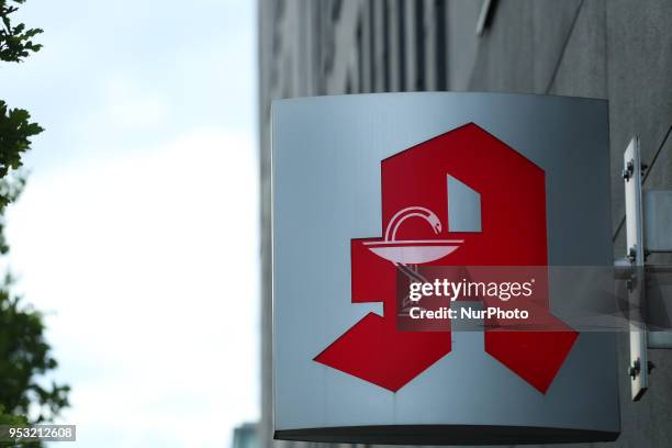 The German logo of a pharmacy is seen in Munich.