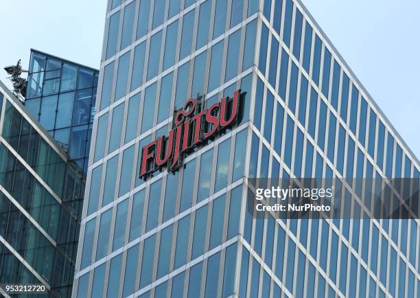 The logo of Japanese multinational information technology equipment and services company Fujitsu is seen in Munich.