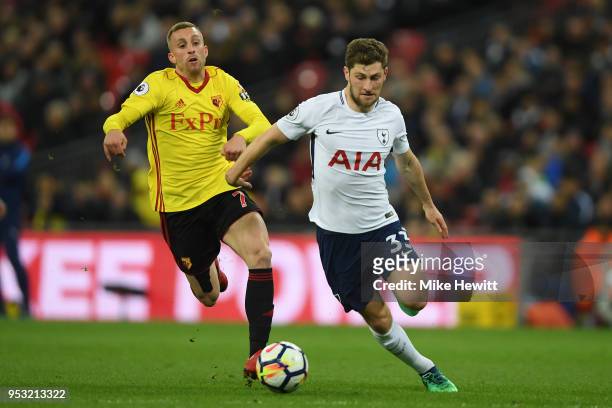 Gerard Deulofeu of Watford challenges Ben Davies of Tottenham Hotspur during the Premier League match between Tottenham Hotspur and Watford at...