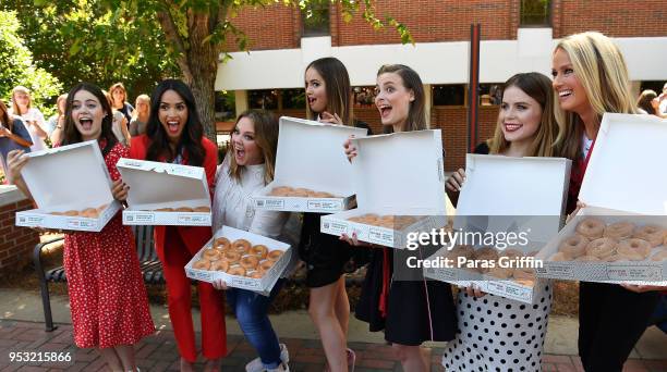 Molly Gordon, Adria Arjona, Melissa McCarthy, Debby Ryan, Gillian Jacobs, and Jessie Ennis passes out Krispy Kreme doughnuts during the "Life Of The...